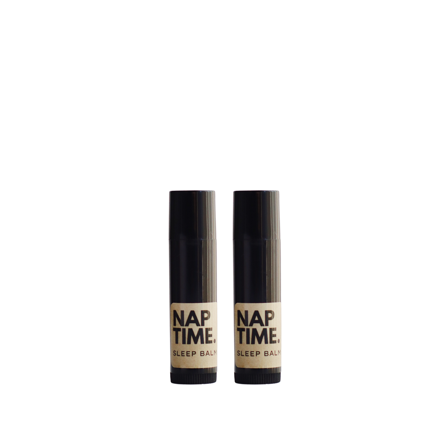 The image displays two identical cylindrical tubes of a product labelled “Nap Time Sleep Balm.” The tubes sleek design each with a black body and cap which gives the product a modern and unisex appeal. The label on each bottle has a minimalist design with a beige background and black lettering, clearly stating the product name and its designation as a sleep balm.