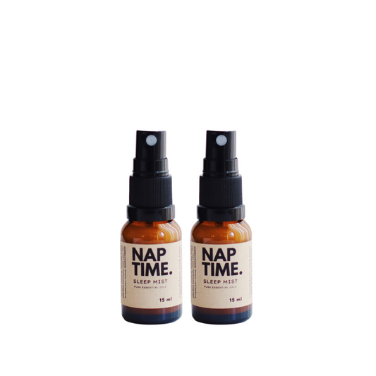 The image features Australia’s Best all-natural sleep spray “Nap Time”. It includes two 15 ml bottles of sleep mist with spray nozzles.  The Product is labelled with a minimalism design, containing pure essential oils designed to promote better sleep naturally.
