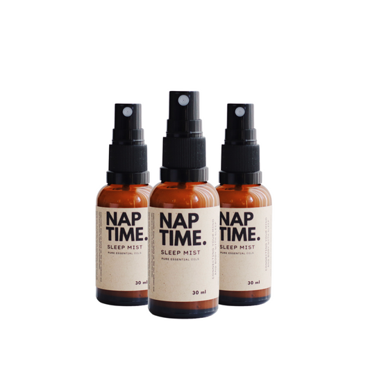 The image features Australia’s Best all-natural sleep spray “Nap Time”. It includes three 15 ml bottles of sleep mist with spray nozzles.  The Product is labelled with a minimalism design, containing pure essential oils designed to promote better sleep naturally